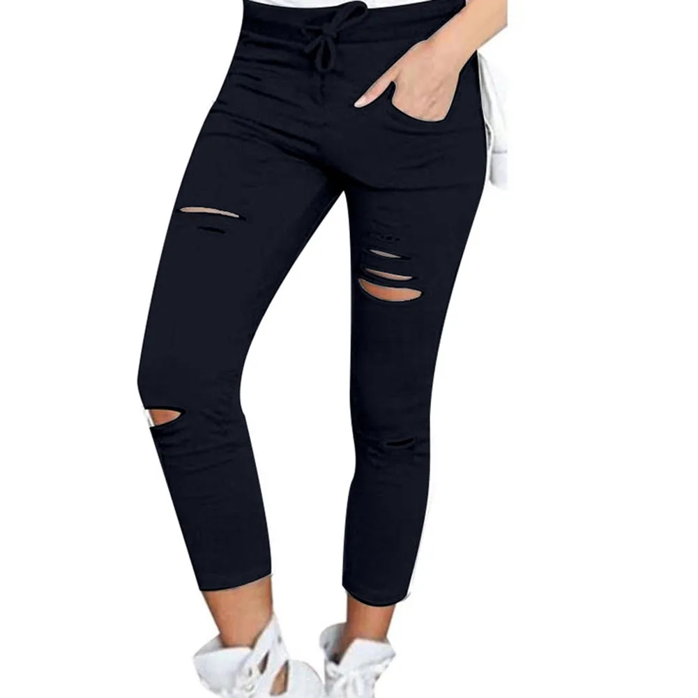 Fashionable broken torn women's trousers