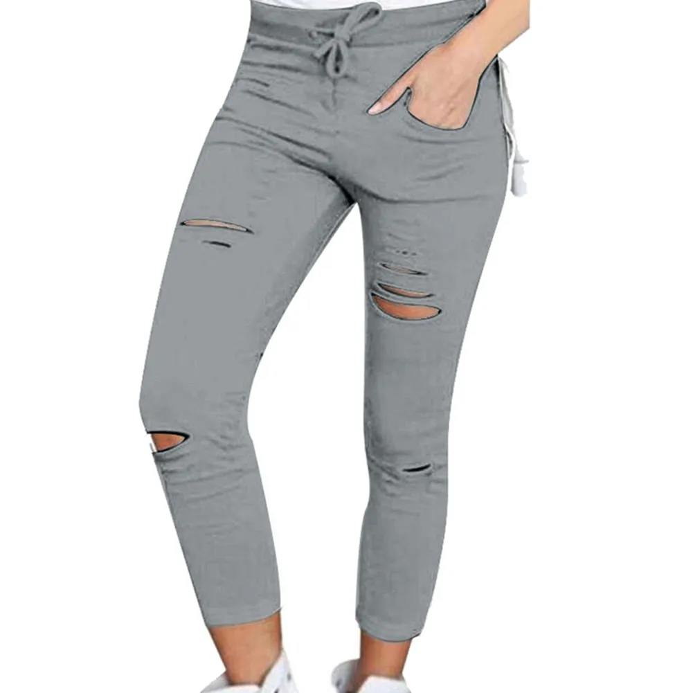 Fashionable broken torn women's trousers