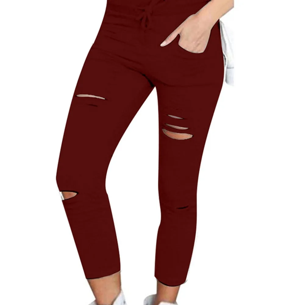 Fashionable broken torn women's trousers