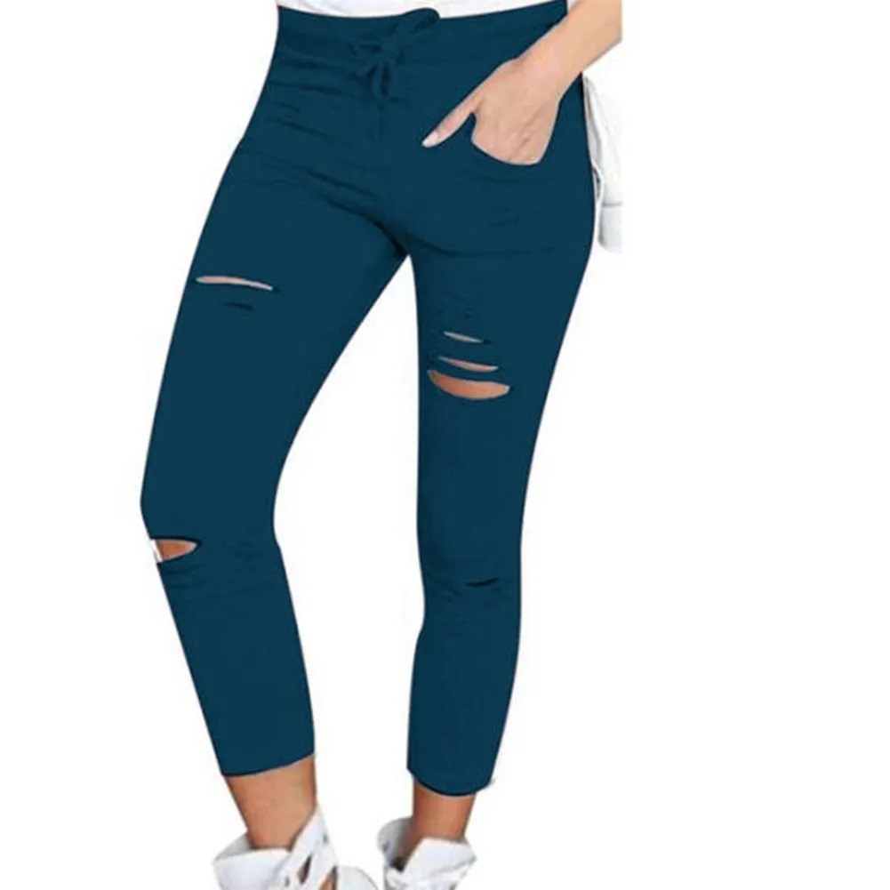 Fashionable broken torn women's trousers