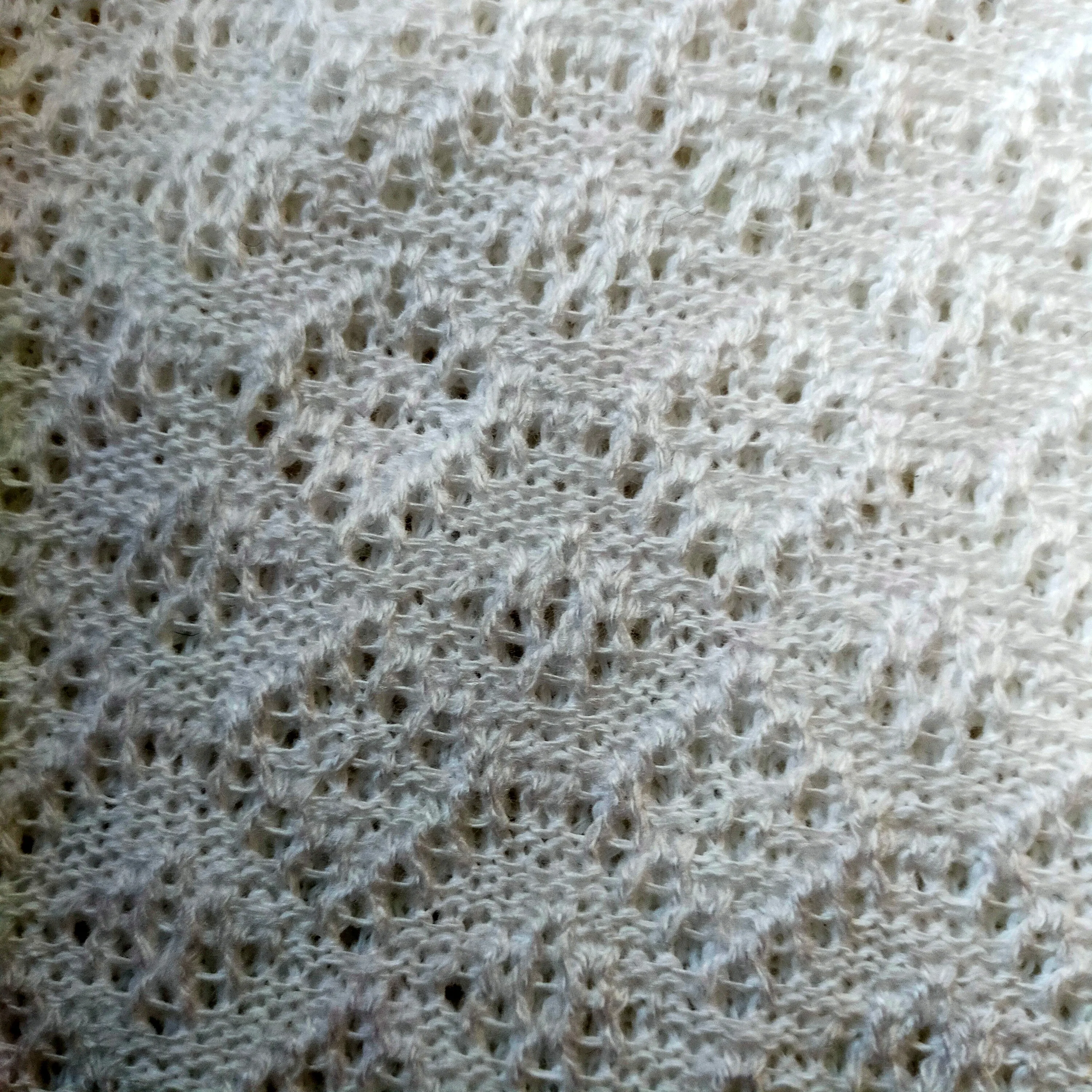 Knitted women's vyshyvanka with a yellow-blue ornament