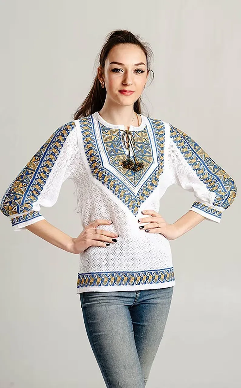 Knitted women's vyshyvanka with a yellow-blue ornament